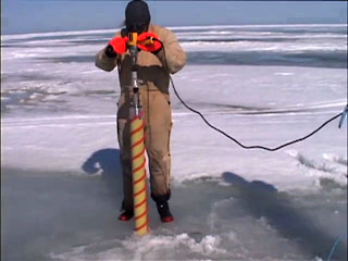 photo of drilling on ice